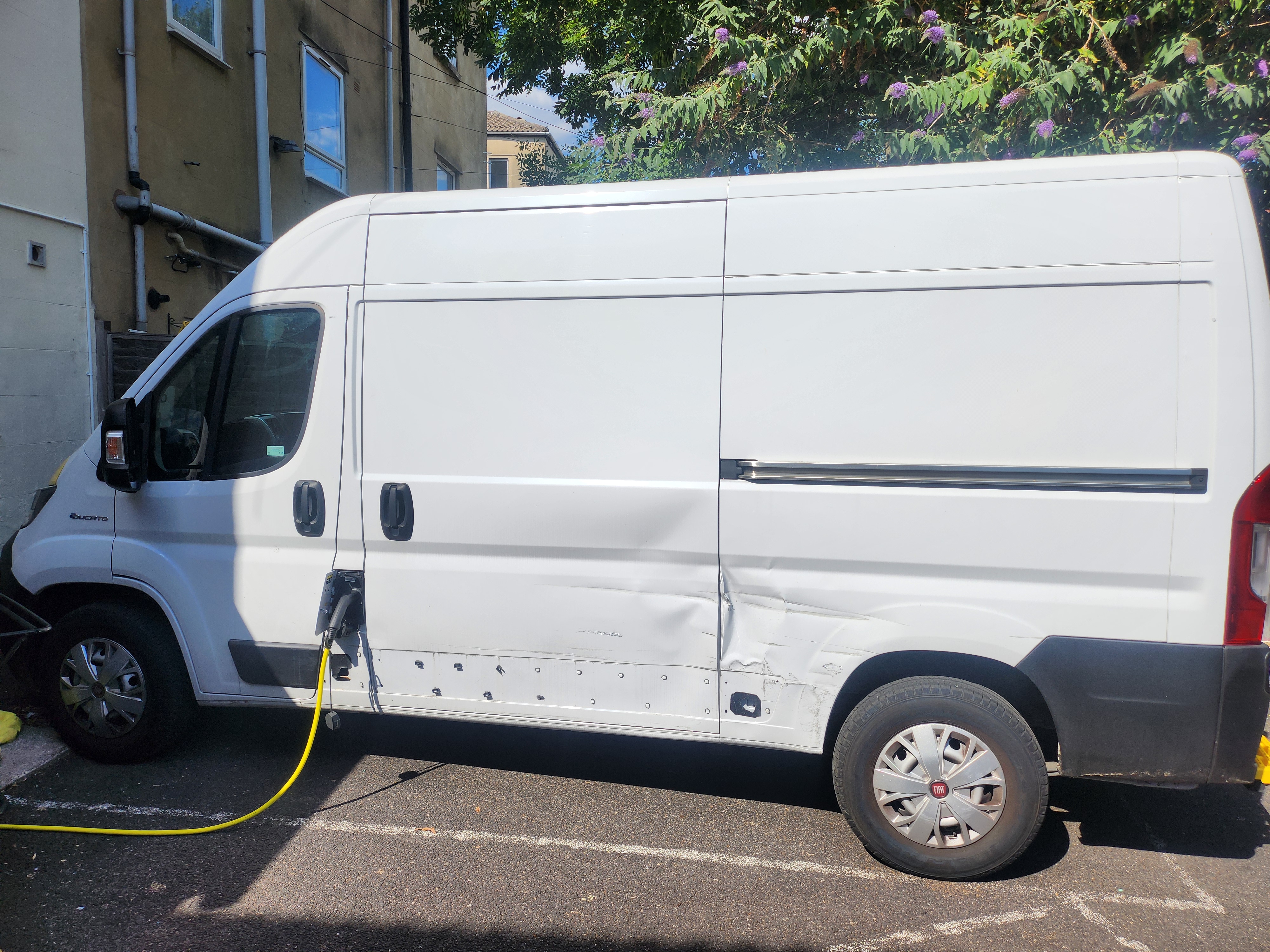 New One25 outreach van Wide electric van from the side